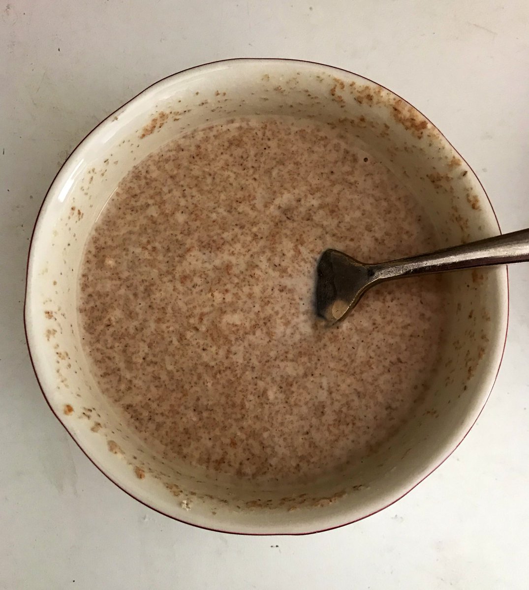 Let’s get started. We have some lovely whole meal organic hard red wheat flour, mixed with water until it’s just a bit thick; fluid but not runny. (If you’re a supernerd like me, you can pasteurize the flour first by baking the whole unopened bag at 160F/70C for 45 minutes.)