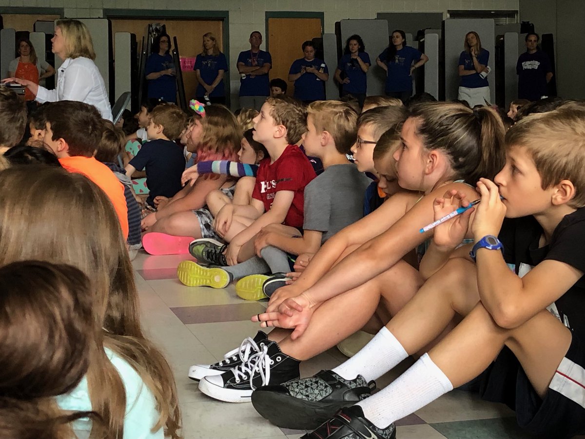 Numbersm1's tweet image. Second graders begin crossover to the Miller School with their second grade teachers standing proud in the background.  #hft