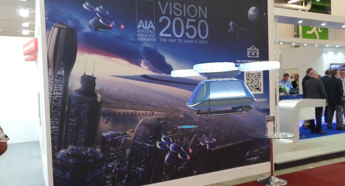 AIAspeaks's tweet photo. Air taxis landing in the #USPavilion? Don't worry - it's just our augmented reality Vision 2050 mural. Stop by the mural in Hall 3 to experience the future of #aerospace: https://t.co/uReAGIwcAF #WaytoWhatsNext #avgeek #ParisAirShow #PAS19 #USatPAS https://t.co/ZBbNmKKtYR