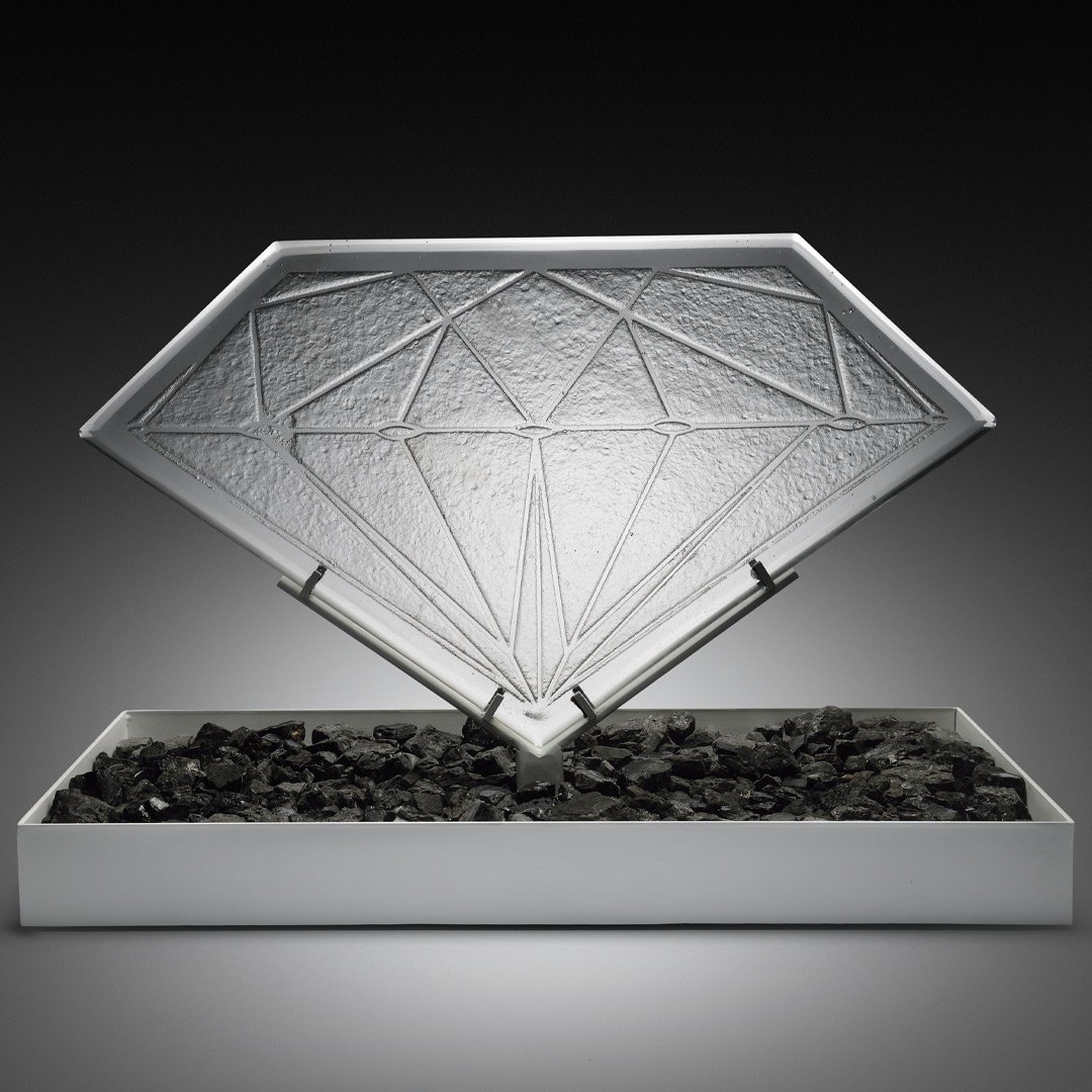 tdglassstudio's tweet image. "Crystal Diamond" is a cast glass diamond highlighting the many facets depicted in this form. The result is a crisp, elegant design which hovers above a base of black granite stones. Each piece is one of a kind. DM for inquiries! #castglass #coldwork #glasssculpture #sandcasting