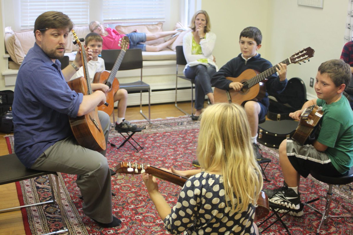 Last night, SSC celebrated our amazing faculty and staff with an end-of-year BBQ. We'd post a picture, but we had too much fun and too much food to take pictures. So here's a throwback of Suzuki great George Little teaching!