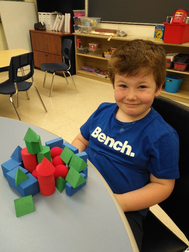 So the best part of Kindergarten today was building a house out of castle parts. 3D shapes are fun!