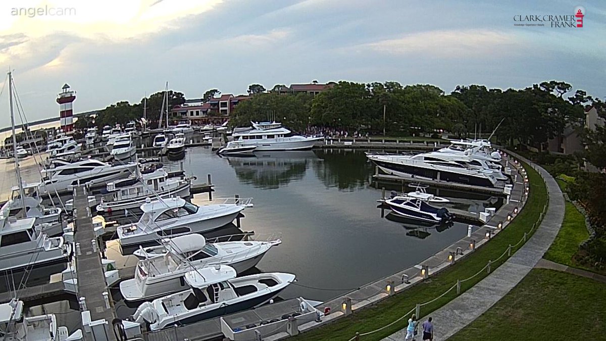HiltonHeadLife's tweet photo. The Harbour Town webcam looks good tonight. See the crowd under the Liberty Oak?  https://t.co/uUAOxYraVi  #HiltonHeadIsland #webcam https://t.co/TRPPIiy8jl