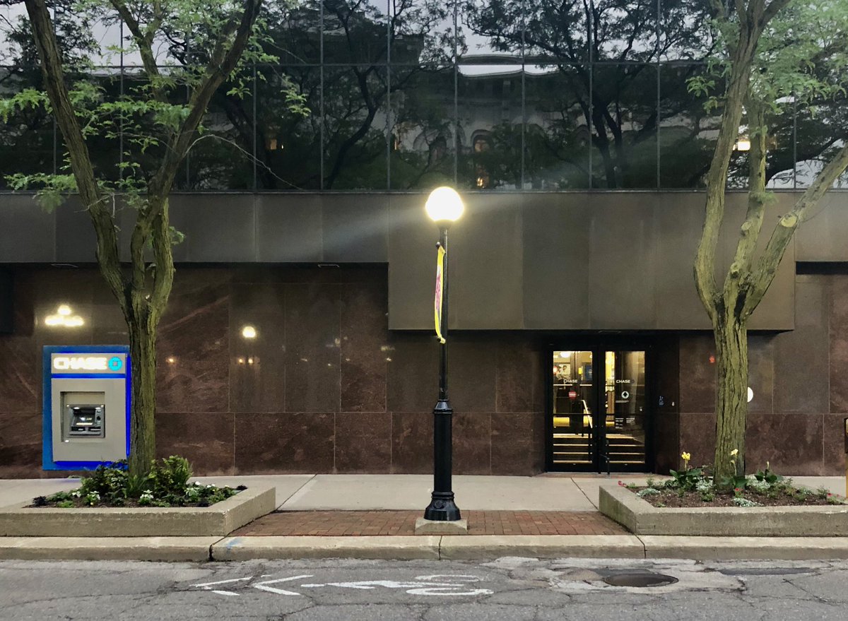 David Osler, National Bank & Trust Renovation (1980) /// Osler‘s solid glass renovation replaced the top floors of the aging 1950’s building, leaving the original marble-clad ground level intact.