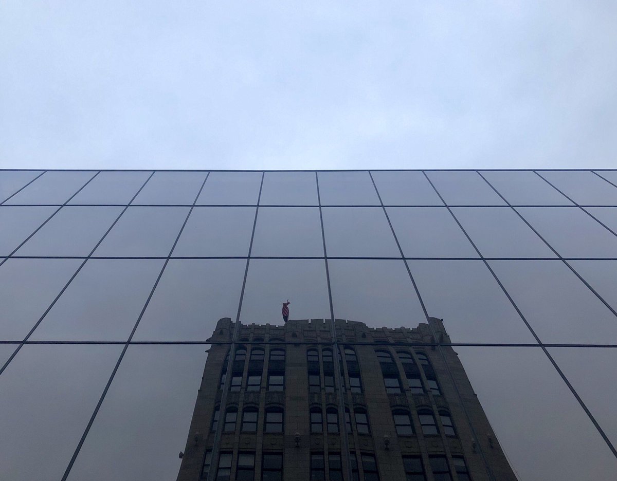 David Osler, National Bank & Trust Renovation (1980) /// Osler‘s solid glass renovation replaced the top floors of the aging 1950’s building, leaving the original marble-clad ground level intact.