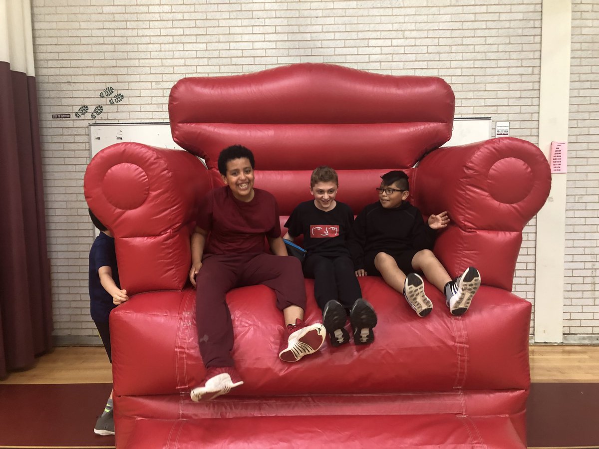 These guys had so much fun on the red chair I had to take a picture! #6thgradepicnic #rainorshine #wealwayshavefun #AMDrocks #selfiechair @PrincipalAMD @craigdreves