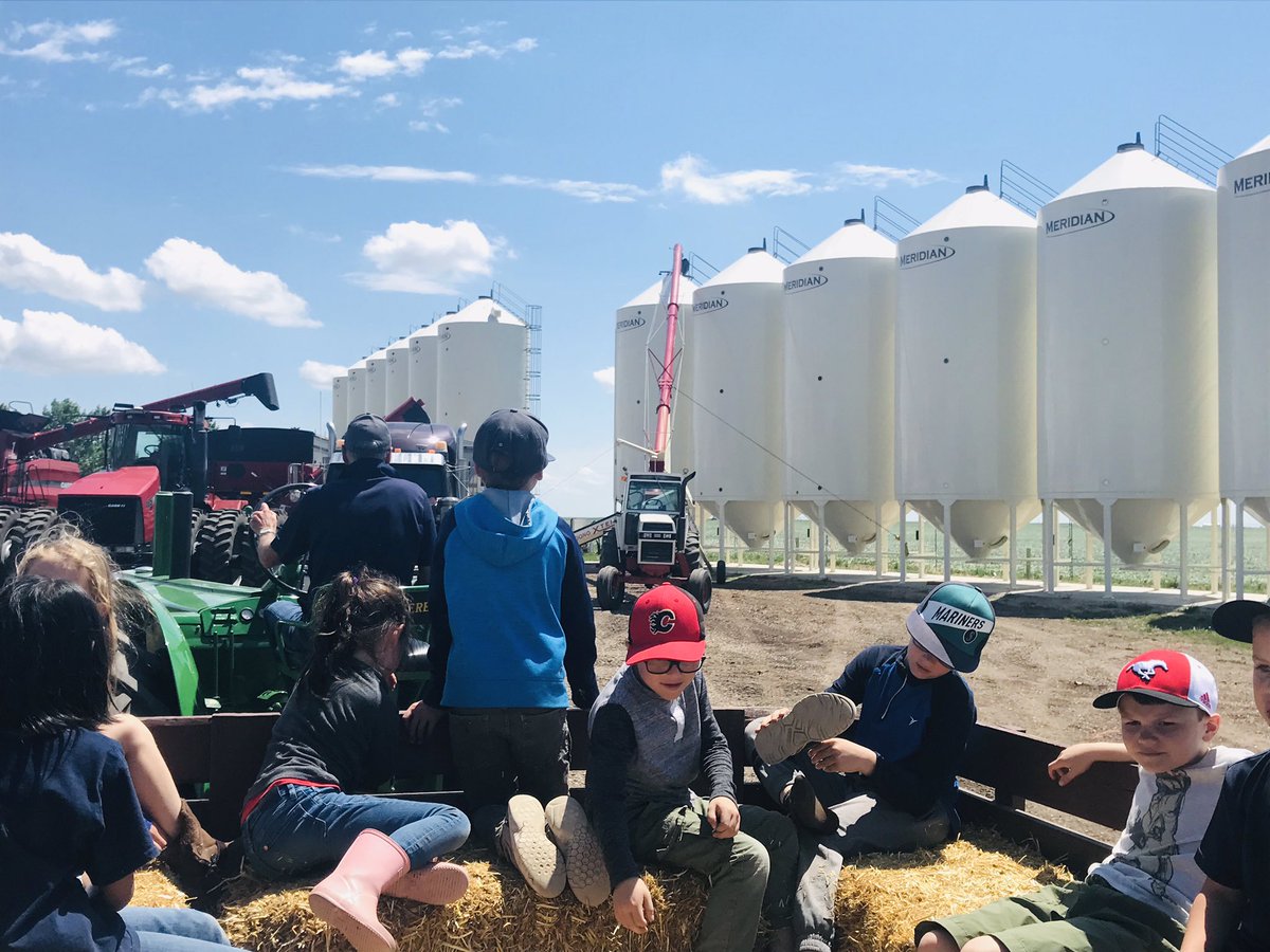Touring the farmyard behind the tractor while sitting on bales of straw was so much fun! We loved seeing a 2-day-old kitten, the huge grain elevators &amp; all the fields🌿🍃🎋🌱 #EHSOurstory