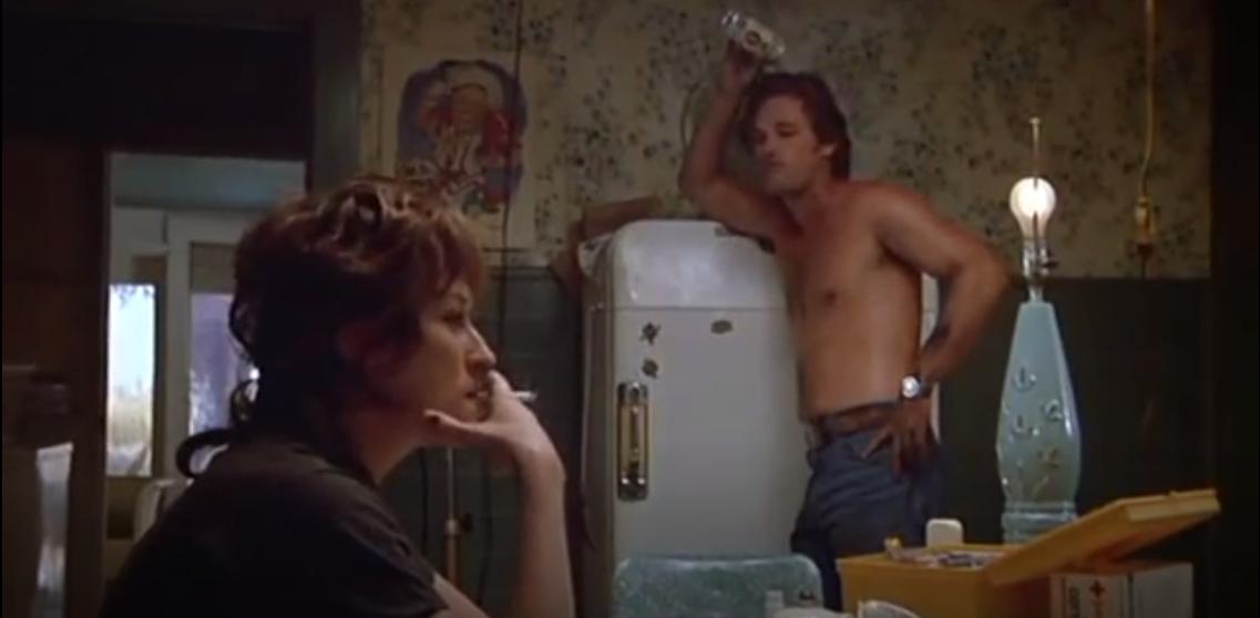 Kurt Russell in SILKWOOD pouring beer over his head like he's in FLASH...