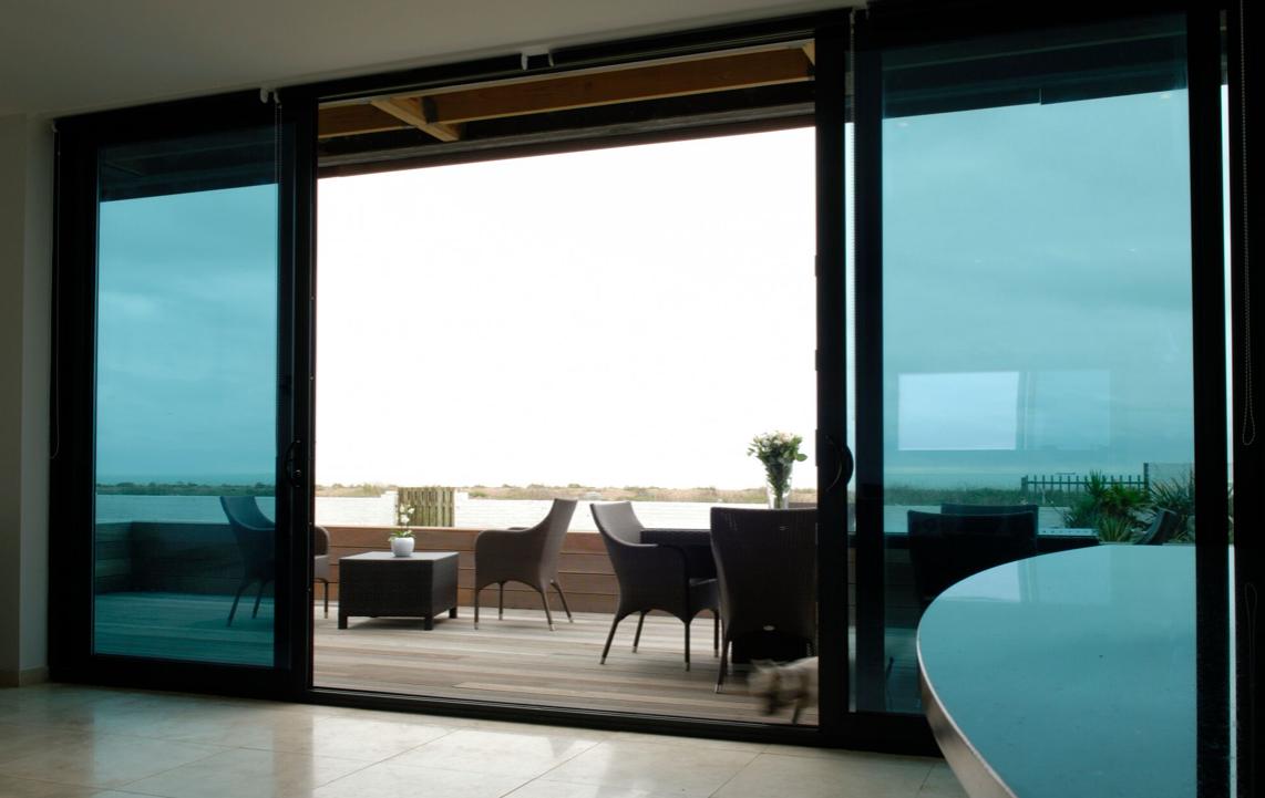 REAL Aluminium Sliding Patio Doors make them ideal for large-span areas. 
A Sliding Patio Door will offer you the largest uninterrupted 
glass area and once open doesn’t take up room on a patio 
or balcony, or inside the home.