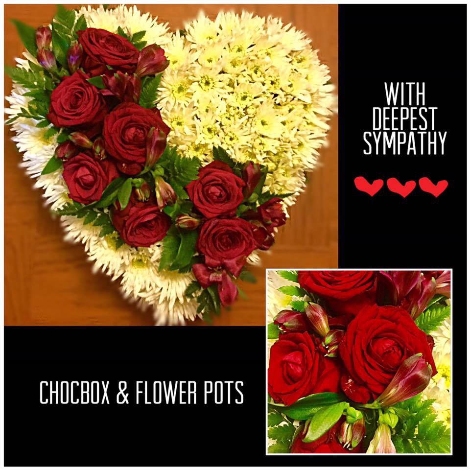 chocboxflower's tweet photo. Beautiful funeral tribute in the shape of a heart with white chrysanthemums and red roses. @chocboxflower https://t.co/kxK3gdc9cV