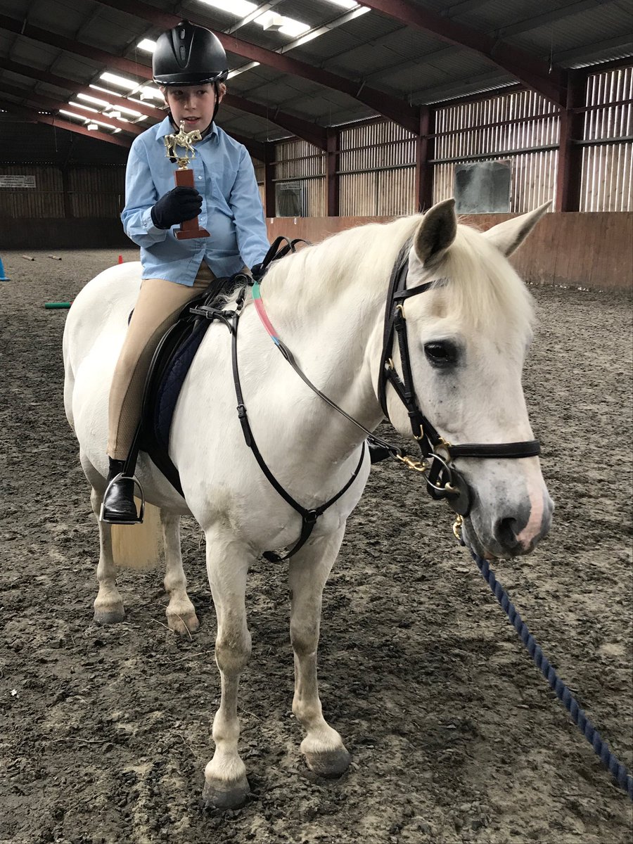Stanley with the Junior Riding Trophy awarded annually for riding skills