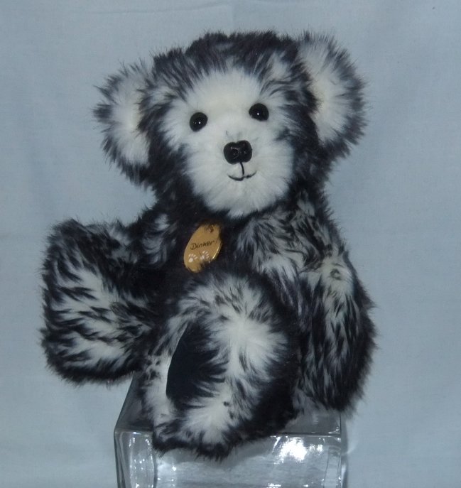 A Dinker Bear with a purpose... sent to someone in need. They bring a lot of love with them.