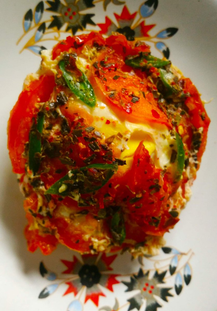 33. Didn't name it. Simply put Egg, Tomato slices, green chili, herbs and microwaved it for 2 mins!!