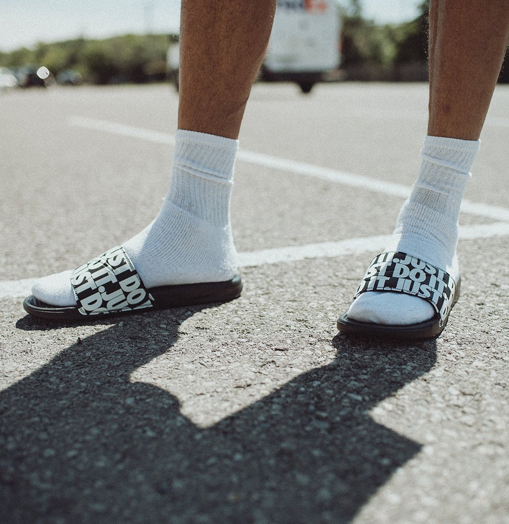 socks and nike slides