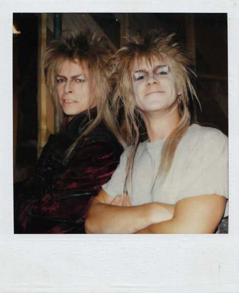 David Bowie &amp; his stunt double taking a break during shooting 🎥 #Labyrinth #JimHenson #DavidBowie #BrianFroud #WendyFroud #TobyFroud #BrianHenson #FantasyFilm #GoblinKing #80smovies #JenniferConnolly #Puppets #PuppetPlace #Hoggle #DarkCrystal #MovieFacts #BTS #Bowie