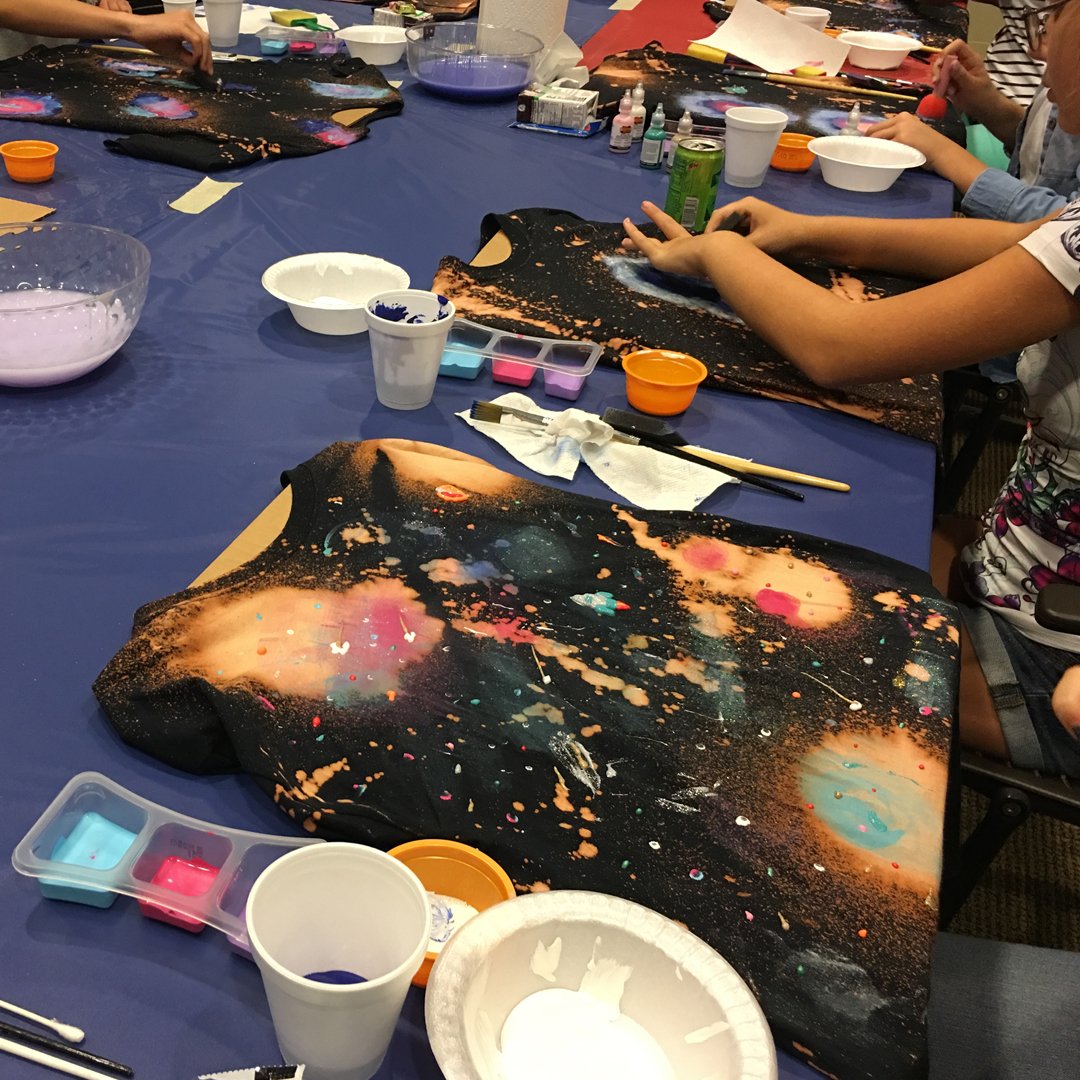 pbclibrary's tweet photo. The Royal Palm Beach Branch Library made their own Galaxy t-shirts, showing off their "out of this world" artistic skills while eating "space munchies" and watching a retro 80's movie. #PBCLSReads #PBCLS50 #SRP #2019SRP https://t.co/EUTd8X4zTp