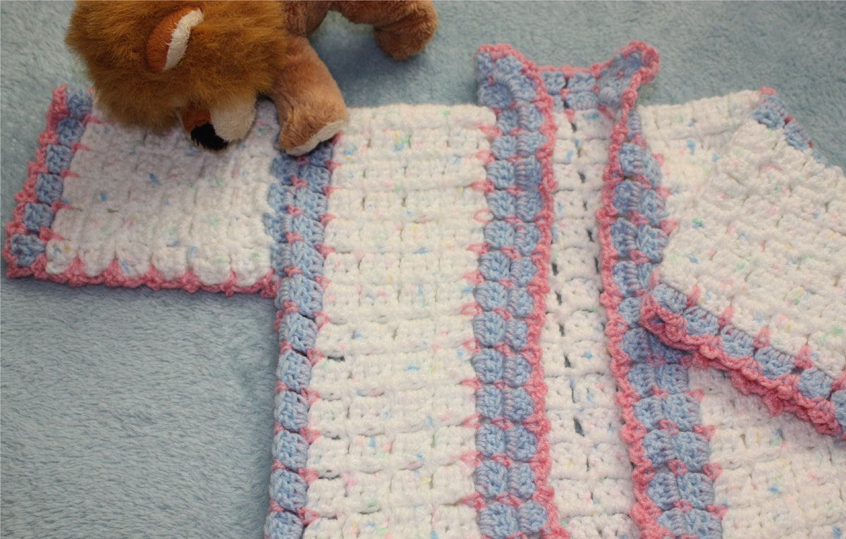 New crocheting for new grand daughter. I love this cardigan that I made from a free pattern I found on Youtube What colours would you choose? http://www.familyclan.info/crocheting-new-grand-daughter/ … #crochet #handmade