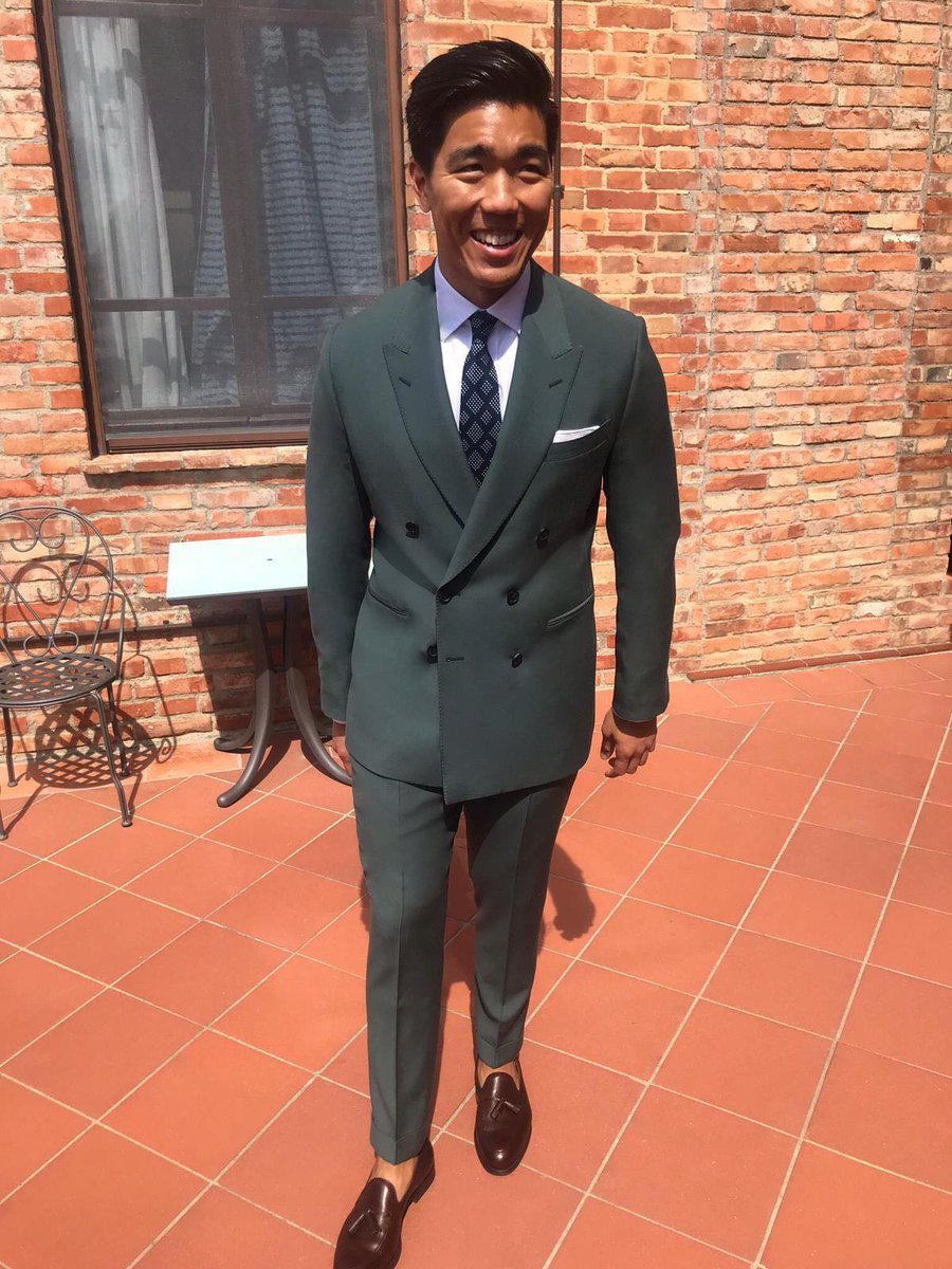 Mr. Jeffrey Fang wears a personally tailored teal wool ARLO suit for his wedding in Tuscany