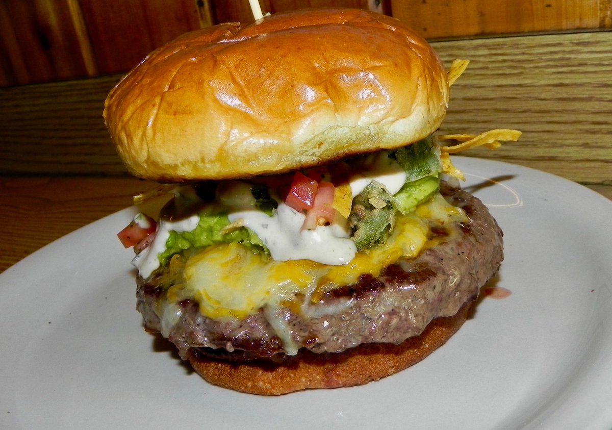 Today- Nacho Momma Burger...1/2lb burger with guacamole, pickled jalapeno's, pico de gallo, crisp tortilla strips on a brioche bun. And...Strawberry Almond Salad with toasted almonds, spring greens, bleu cheese, pickled red onions, balsamic vinaigrette (Mini or Entree' size)