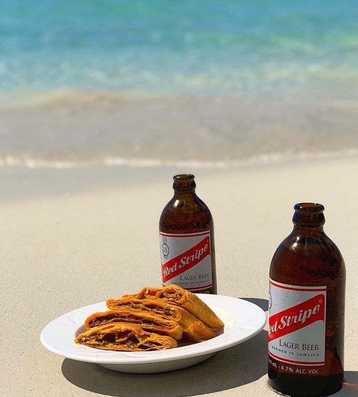 Name a better combo! 😎 #RedStripe #JamaicanPatty #LoveJamaica