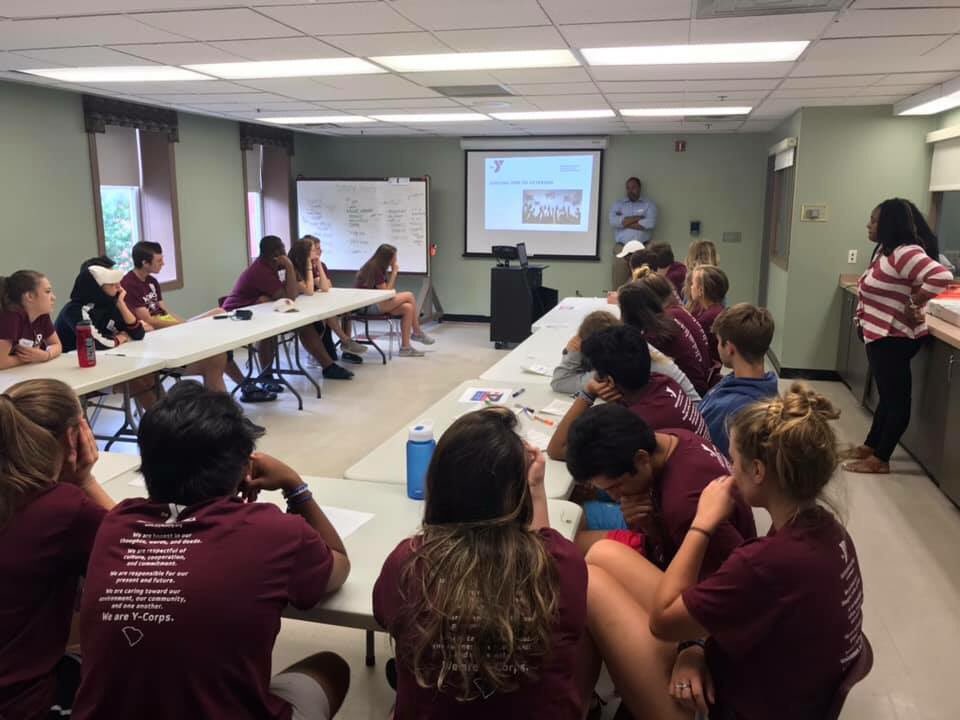 scymcayig's tweet photo. Today’s #YCorps service project was with the @YCentralMD. They partner with a veterans home, and our team sorted donations and made art for the home. 

The Druid Hills #YMCA is 100 years old, and has a history that includes both Dr. Martin Luther King Jr and Thurgood Marshall. https://t.co/SrR6ruqQh4