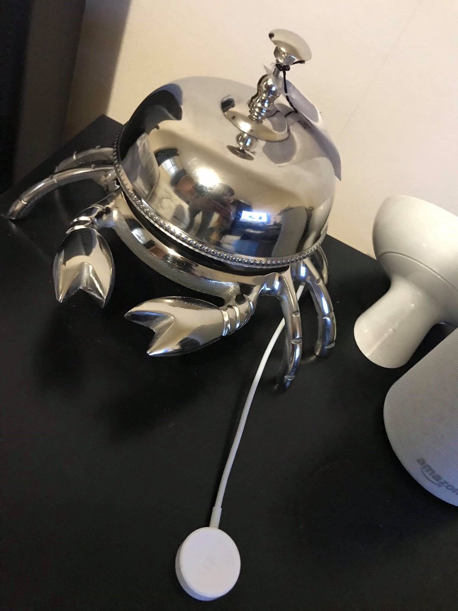 SecretCrabBell's tweet photo. Crab bell is settling in to its temporary home well (my fiancée met me moments after purchase, so had to bundle it into my best friends bag and smuggle it away).
Somehow she spotted it.
Threats to “throw it off the end of Brighton Pier” were made. Good job we live in London. https://t.co/Bwj9OU0wD4
