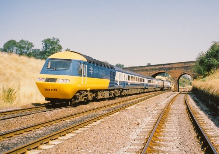 RailwayCentral's tweet photo. #HST short set 253046, units 43173/43174 on a driver training exercise in the Summer of 81 prior to the introduction of the HST's being introduced on #CrossCountry services on the ex-#GWR main line from #Birmingham to #Reading and the South Coast seen here at #Hatton ๐ธ#AndyHoare https://t.co/wAz5afI5Ki