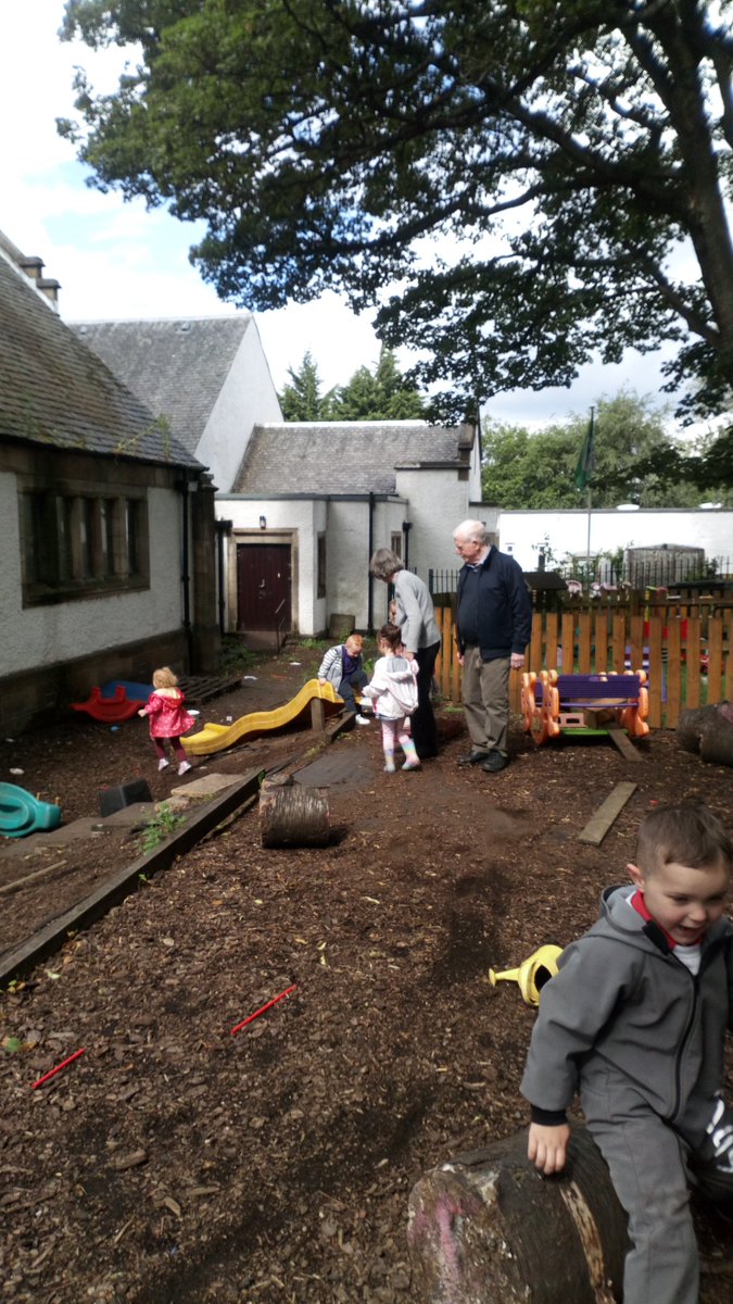 CareAlmond's tweet photo. Evelyn and Thomas in deep conversion with the kids at our local nursery, Evelyn getting out of the boat after a ruff ride, kids made sure of that. But Evelyn loved it https://t.co/szaJbEorfw