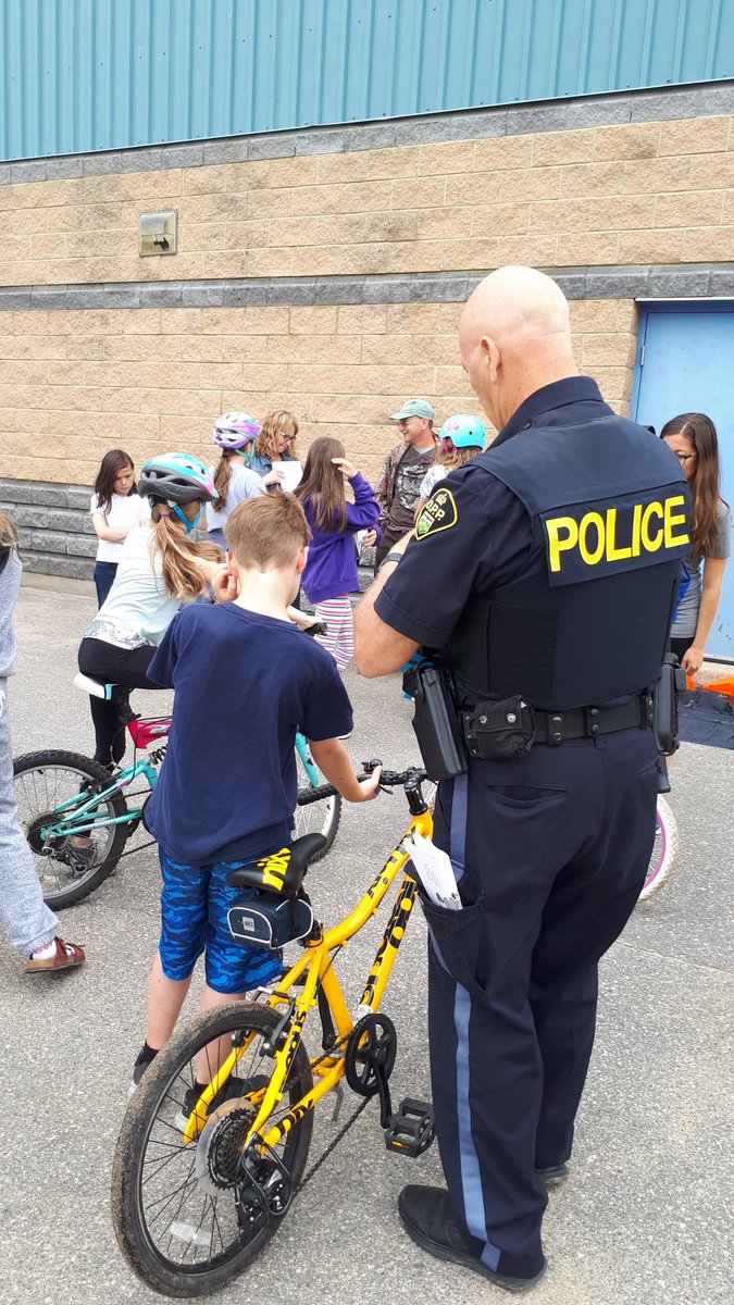 Students see a demonstration on how wearing a helmet protects their brain.