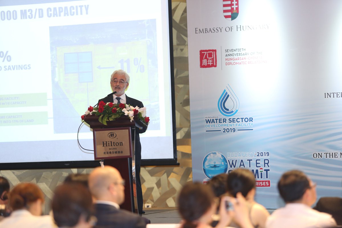 biopolus's tweet photo. Mr. Kenyeres introduced the main outcomes of the Biopolus Feasibility Study at the first Hungary-China Water Industry Forum in Beijing. The Study demonstrated how traditional WWTPs can be replaced with compact #BioMakeries for a new solution to outdated infrastructure in China. https://t.co/RkgrPyryt3