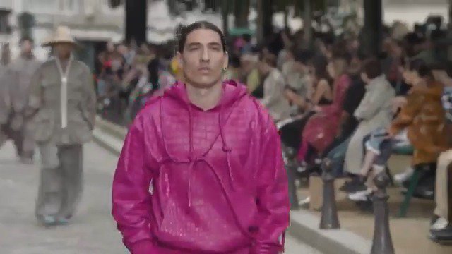 Hector Bellerin struts down the catwalk at Paris Fashion Week as he models  for Louis Vuitton