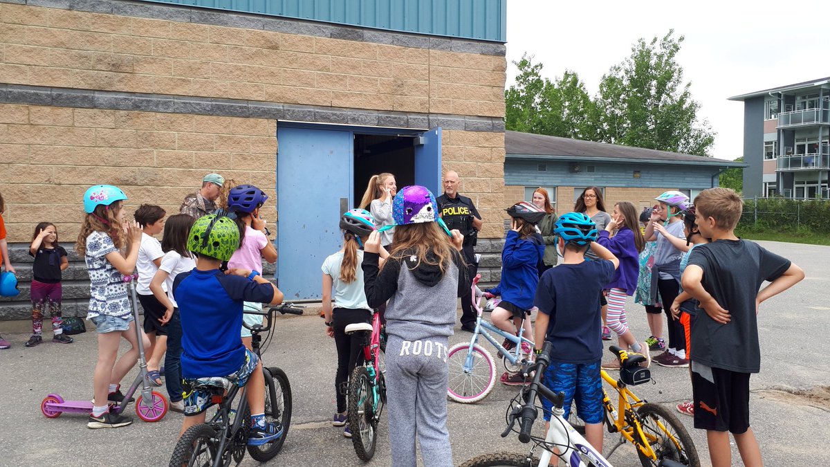 Students learn about Bike Safety with the OPP and North Bay Parry Sound District Health Unit.