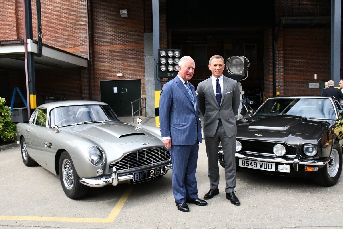 ClarenceHouse's tweet image. Daniel Craig, who plays @007, shows The Prince of Wales two of the @astonmartin cars used in the James Bond films.