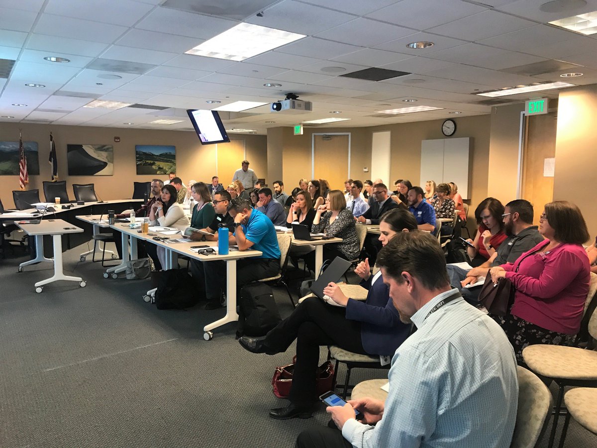 Group of people in a conference room.
