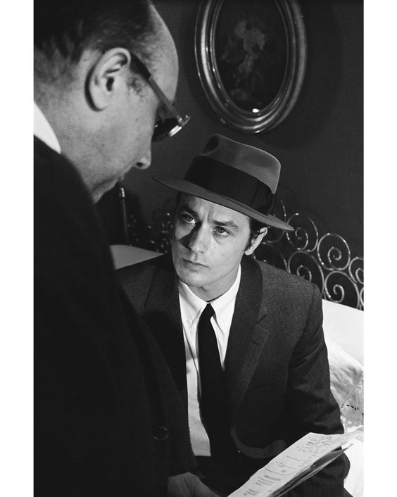 Alain Delon and Jean-Pierre Melville on the set of Le Samourai, working on the script