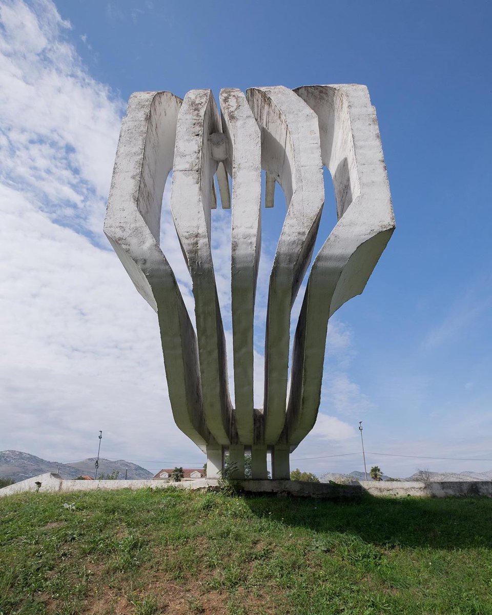 babsperkins's tweet photo. Monument to the Fallen Fighters of Golubovci, #Montenegro
 V.T.Vukotić (#spomenik) &amp; Slobodan Boba Slovinić (bronze  panels)
"Freedom peers through your eyes, flowers bloomed when you died, every dawn above Zeta  weaves a new wreath to your life." https://t.co/ag415fa2w3 https://t.co/hAeTEBWi0n