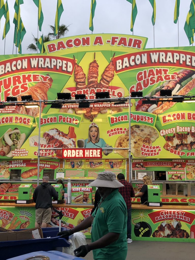 At #sandiegocountyfair ,  the food choices are sick     The BaconA Fair station is bedazzling    Not sure what option to choose or move on 🧐
Place is crazy.  #overstimulated 😛