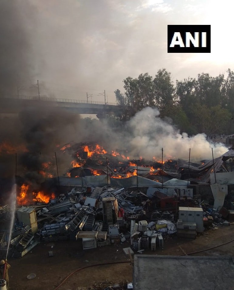Delhi: Fire broke out in a furniture market near Kalindi Kunj metro station, early morning today. Fire official says, "No injuries till now. Fire-fighting operation underway." (ANI)