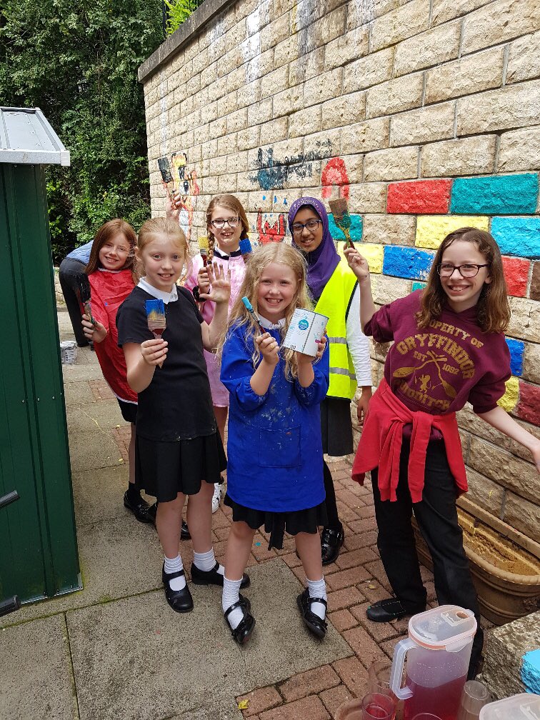 CulterSchool's tweet image. Primary 6 bringing their designs to life on the wall at Eastleigh Care Home. #creativity #CommunityEngagement #fun