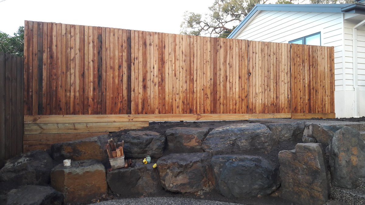 Cypress ship lap secured to a steel frame.