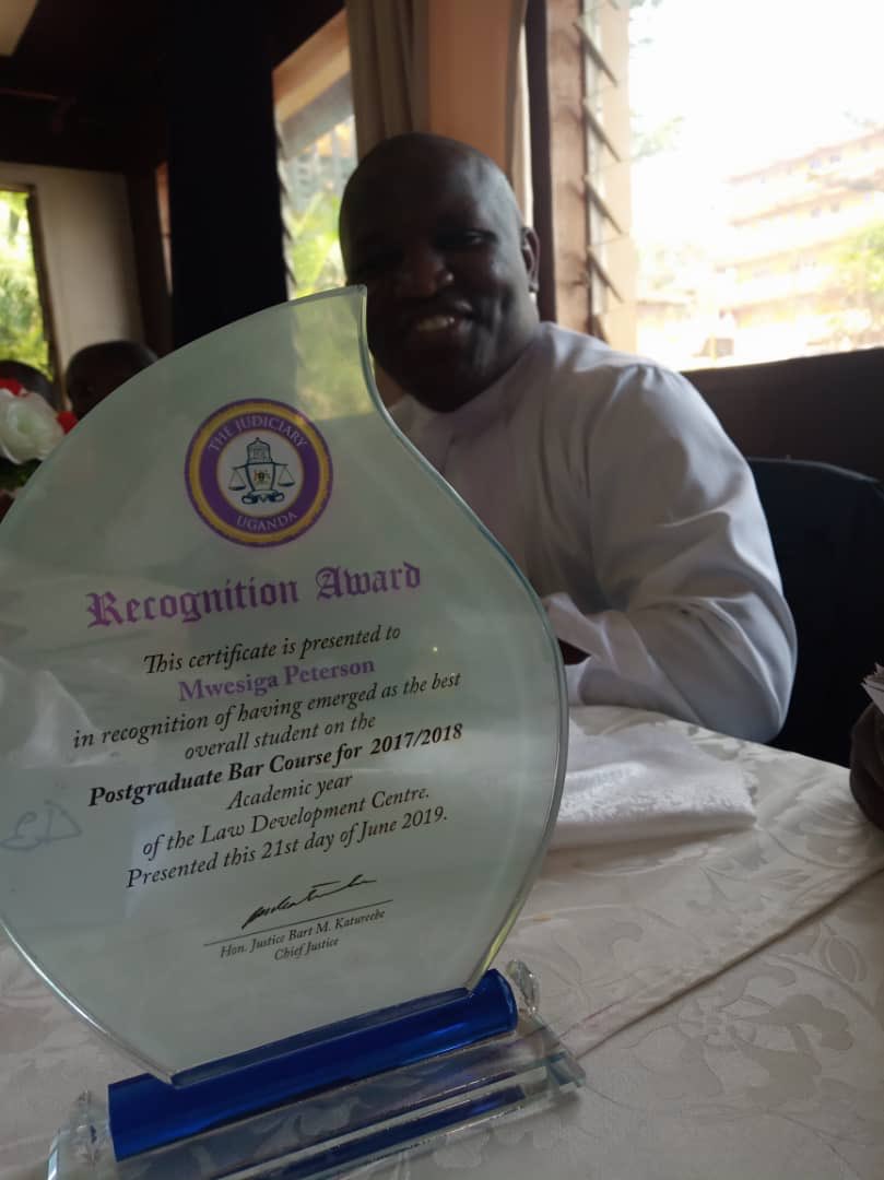 IvanOkuda's tweet photo. Peterson Mwesiga the Giant from Ntungamo and the smartest UGANDAN I have met does it—-AGAIN! First Class (Electrical Engineering), First Class Bachelor of Laws(MUK), Distinction (MSC—Pretoria), Overall Best 2019 (LDC). A modest and decent human being but the finest brain in town! https://t.co/iJLfxdBdVb
