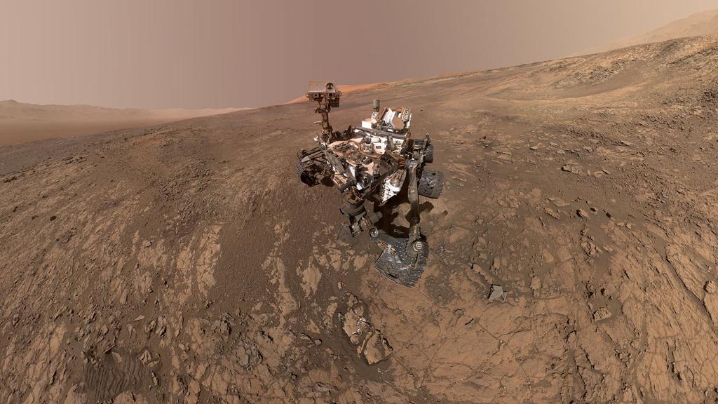 NASA's tweet image. It's #NationalSelfieDay and our @MarsCuriosity rover is a pro selfie-taker, thanks to 17 cameras used for surveying the vast landscape of the Red Planet. 📸 Discover how the rover takes self-portraits using its robotic arm: go.nasa.gov/31P7V8A