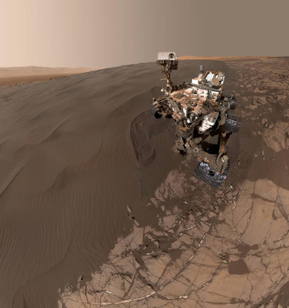 NASA's tweet image. It's #NationalSelfieDay and our @MarsCuriosity rover is a pro selfie-taker, thanks to 17 cameras used for surveying the vast landscape of the Red Planet. 📸 Discover how the rover takes self-portraits using its robotic arm: go.nasa.gov/31P7V8A