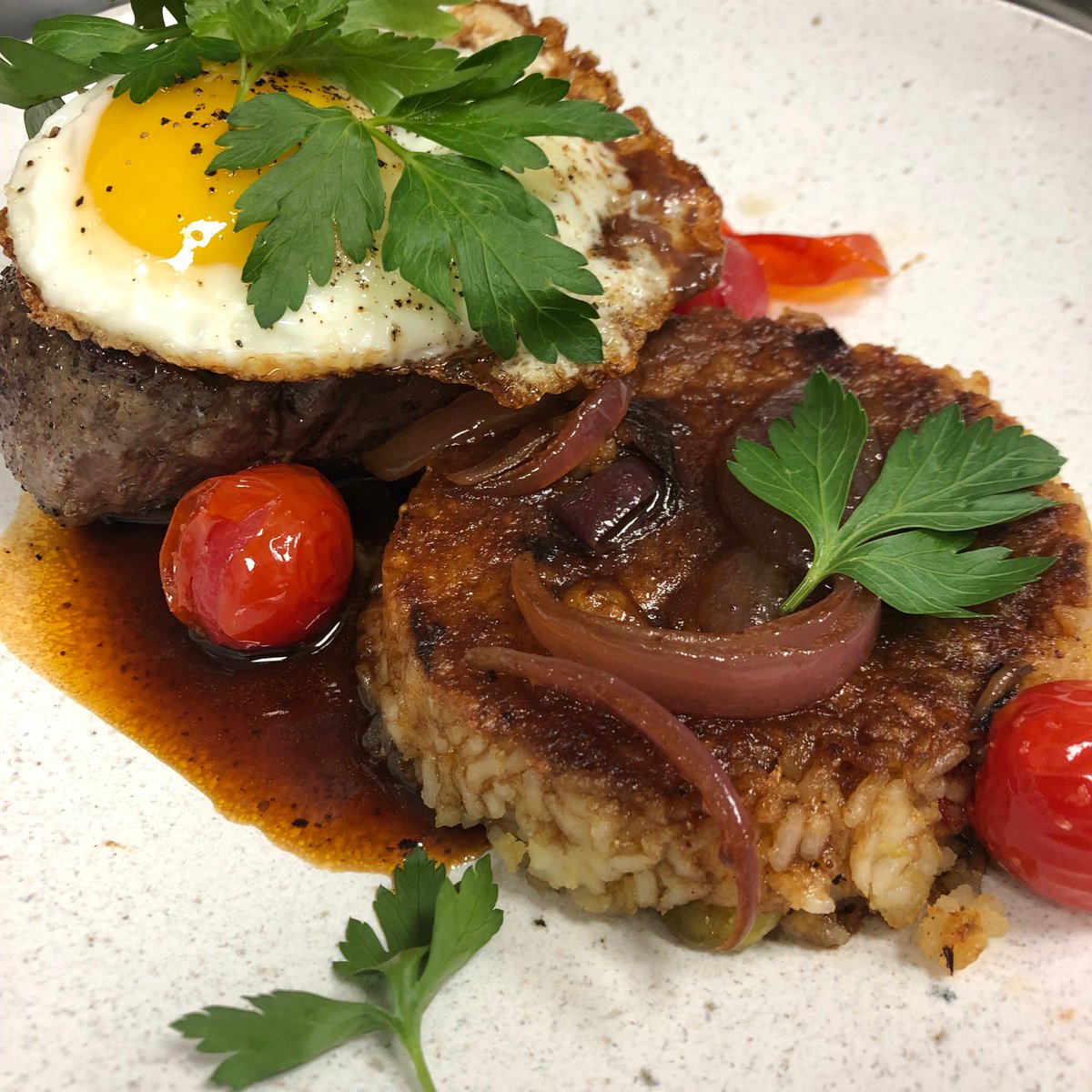 Celebrating the weekend with our delicious Beef Tenderloin Tacu Tacu with Baby Lima Beans, Blistered Tomatoes, Aged Soy, and Red Onion. #dinealysbeach #calizarestaurant