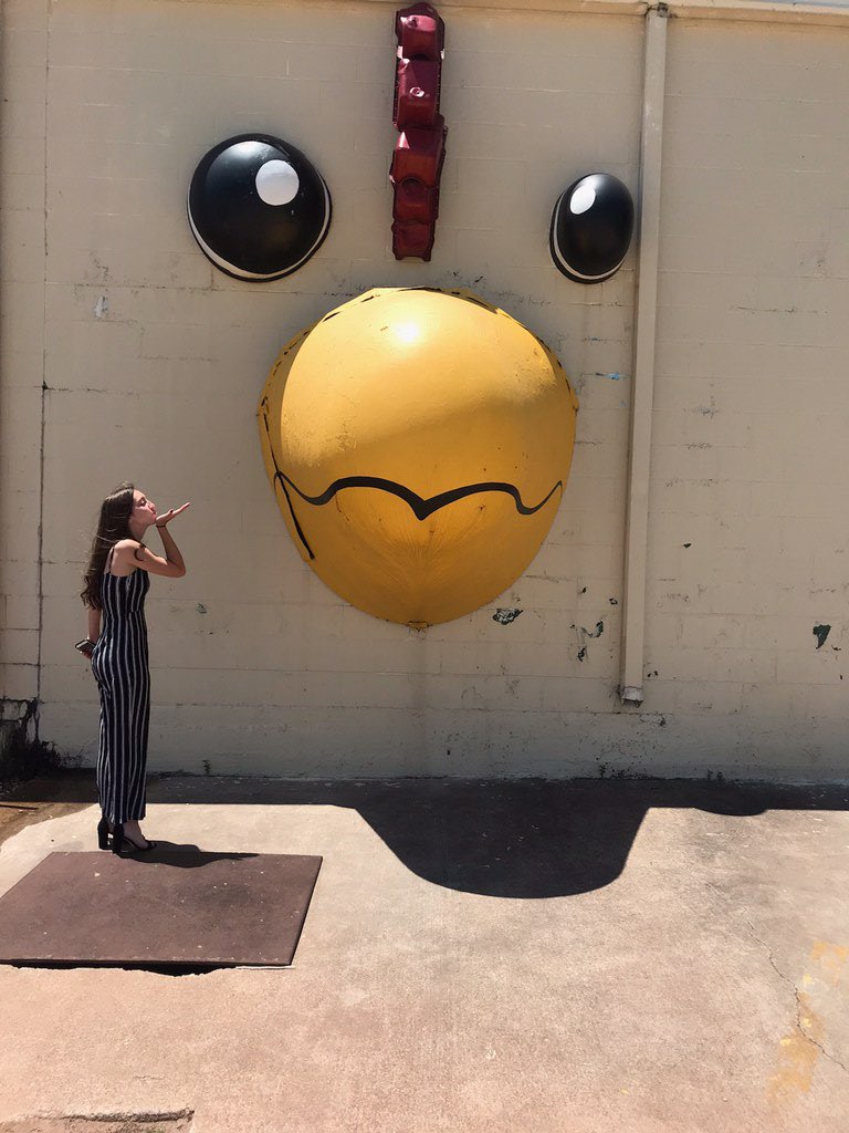 I HAVE NO IDEA WHERE SARAH IS AT BUT ONCE SHE SENT ME A PICTURE OF THIS WALL I TOLD HER SHE BETTER GET A PICTURE WITH IT AND NOW LOOK AT WHAT I HAVE