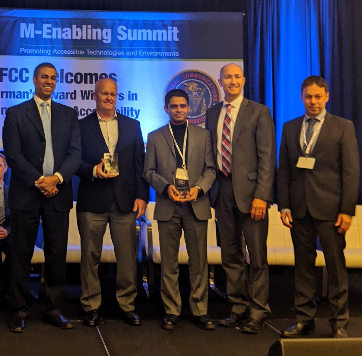 FCC's tweet photo. #ChairmansAAA recognizes services, products, & other creative developments that improve the lives of those with disabilities with accessible #telecom & #tech. Congrats to 2019 award winners: https://t.co/e2tNe2ac4X #a11y #mEnabling19 https://t.co/p5jWLVPEdl