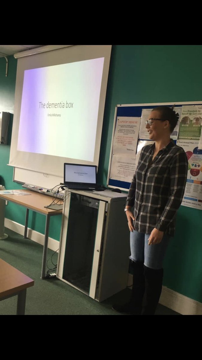 acute_amu's tweet photo. Our lovely Emily presenting ‘The AMU Dementia Box’ We are so proud of what she has already achieved with this project! #AMU #makingadifference #dementiamatters #dementiachampion #nurse #acutemedicine https://t.co/mO77m6I2G7