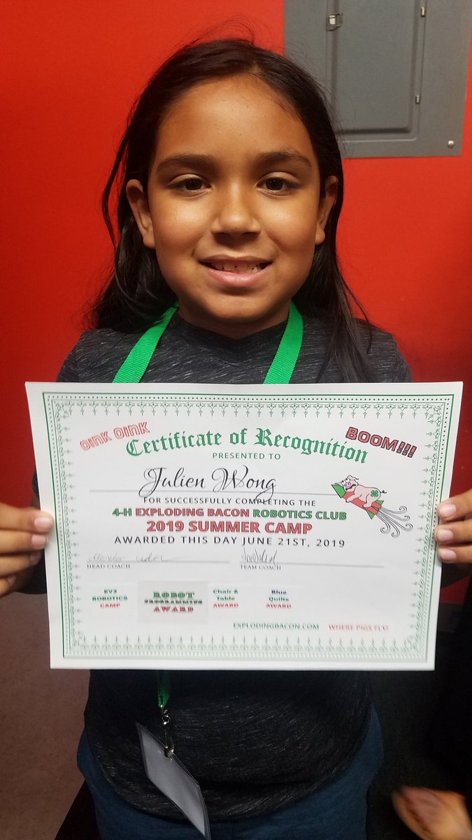 My son, Julien, and his friend Ameer, completed the 4-H Exploding Bacon Robotics Club 2019 Summer Camp. 
Our FLLJr kids are big fans of team <a href="/frcbacon1902/">4-H Exploding Bacon</a>. Julien loved his team coach, Jordan, and everyone over there! 🤖