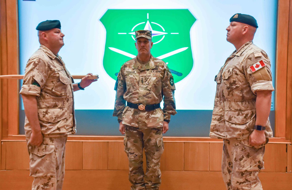 LANDCMD's tweet photo. Standing left to right, Canadian Army CWO Rice, the outgoing CSEL of LANDCOM; U.S. Army LTG Thomson, Commander of LANDCOM; and CWO Mathers, the incoming CSEL; stand on stage prior to the passing of the pace stick during the Change of Responsibility at the LANDCOM HQ held June 21. https://t.co/92da1LnOq4