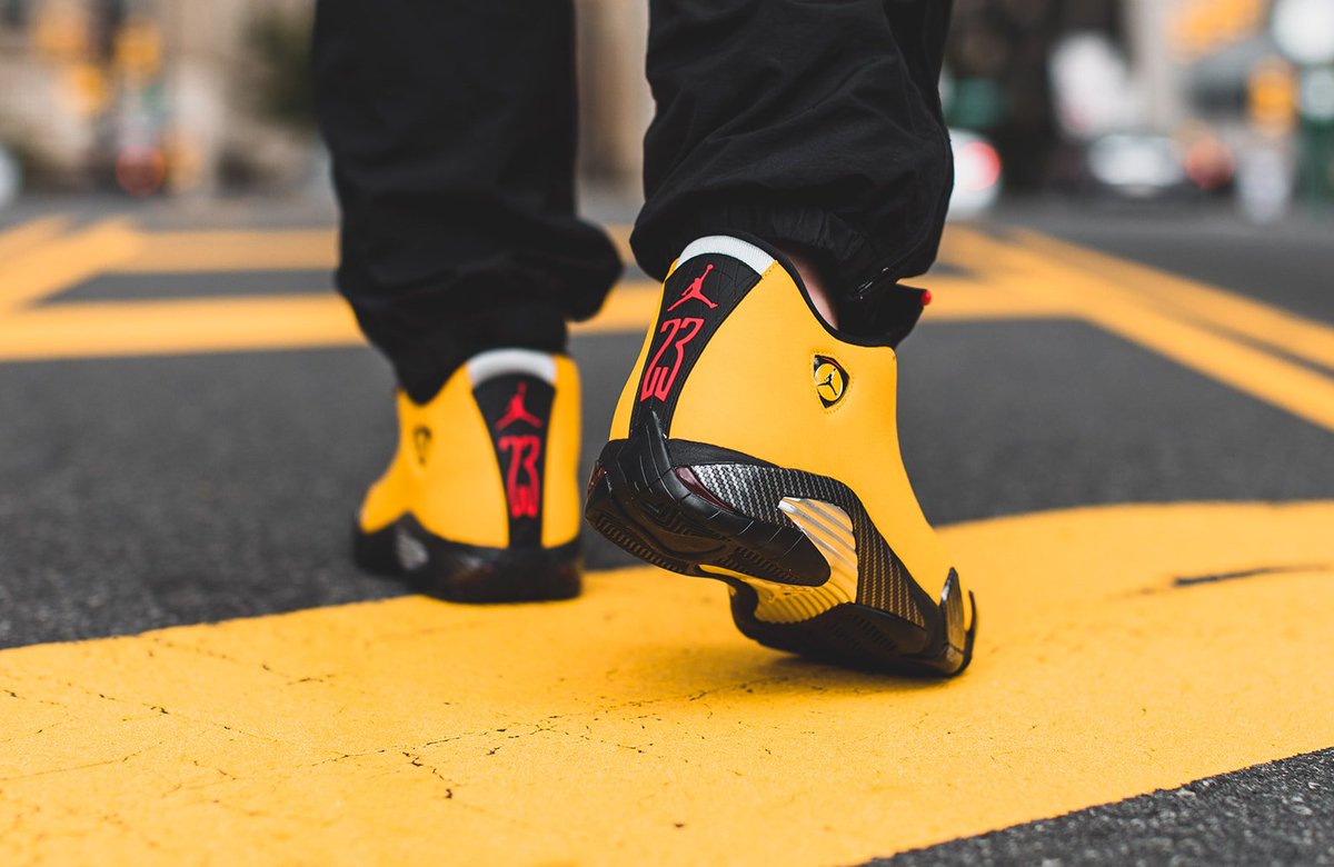 yellow ferrari 14s on feet